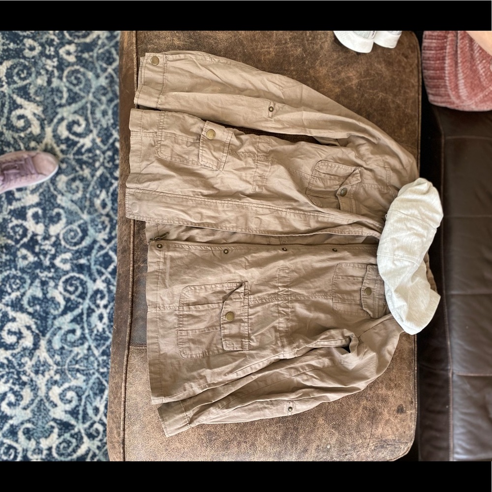 Tan, cargo style jacket with hoodie, good condition.